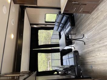 Wolfpack Toy hauler with three queen beds party deck full kitchen bath