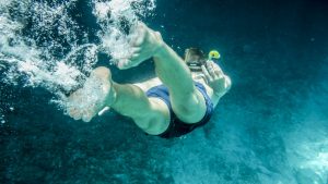 a person snorkeling in the ocean