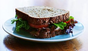 turkey, lettuce, and tomato sandwich on whole wheat bread