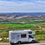 RV with scenic background