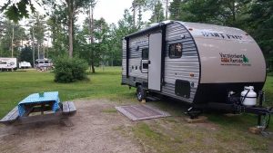 travel trailer parked at an RV campground