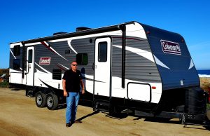 Erik Abbott in front of his RV rental