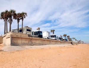 row of RV camping by the beach