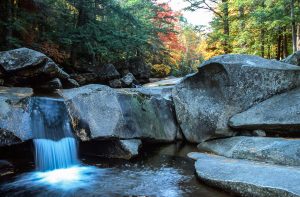 Waterfall in a forest in Maine